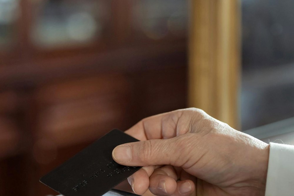 A point-of-sale payment terminal ready to accept a tap-to-pay card